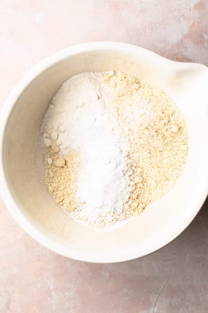 dry ingredients for gluten free cake in a large mixing bowl