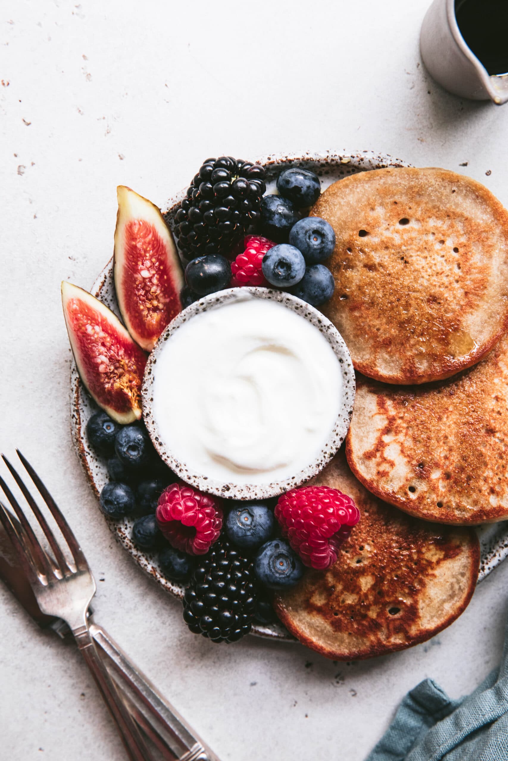 vanilla buckwheat pancake platter with blackberries, figs and blueberries