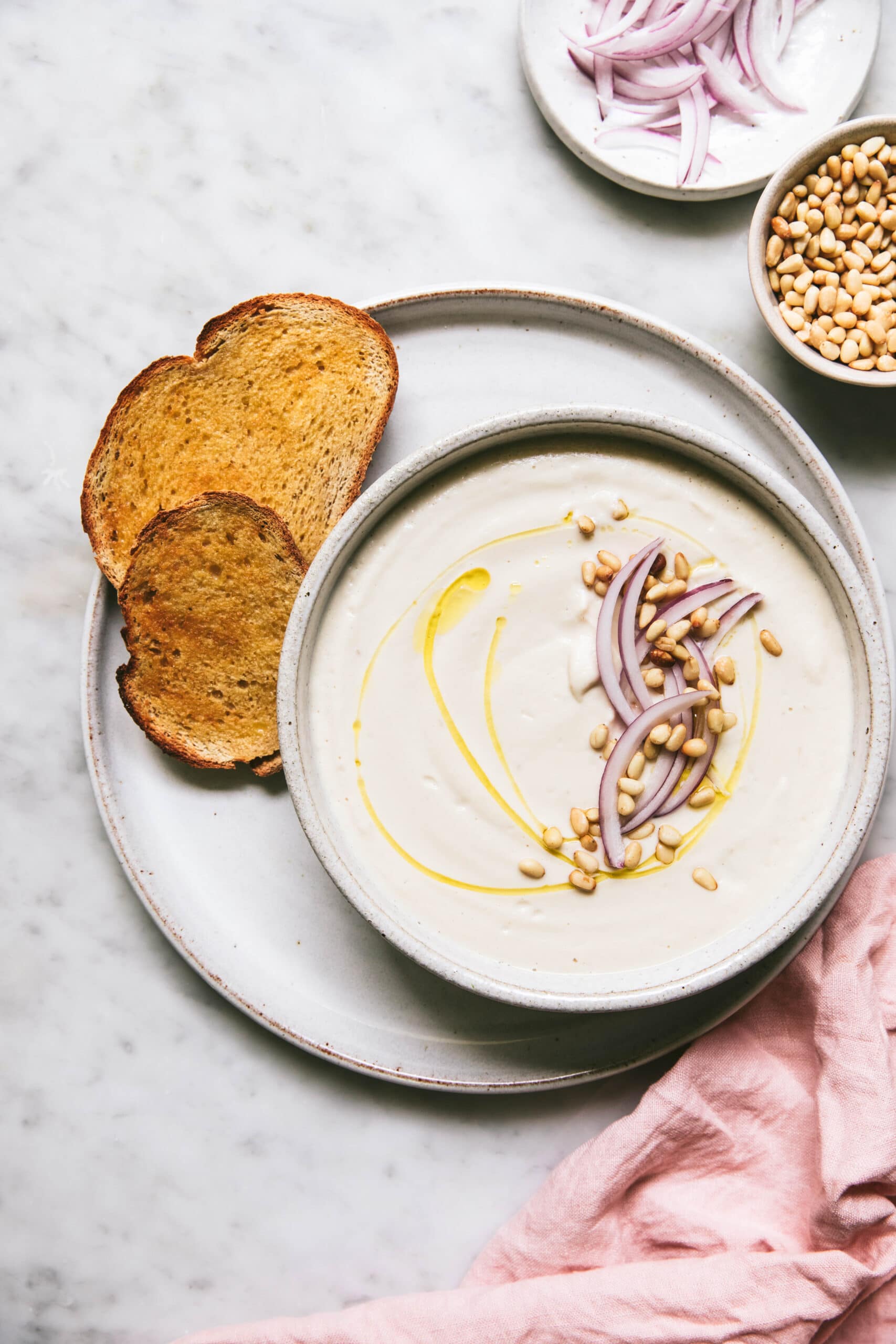 dairy free cauliflower soup served with toast and butter