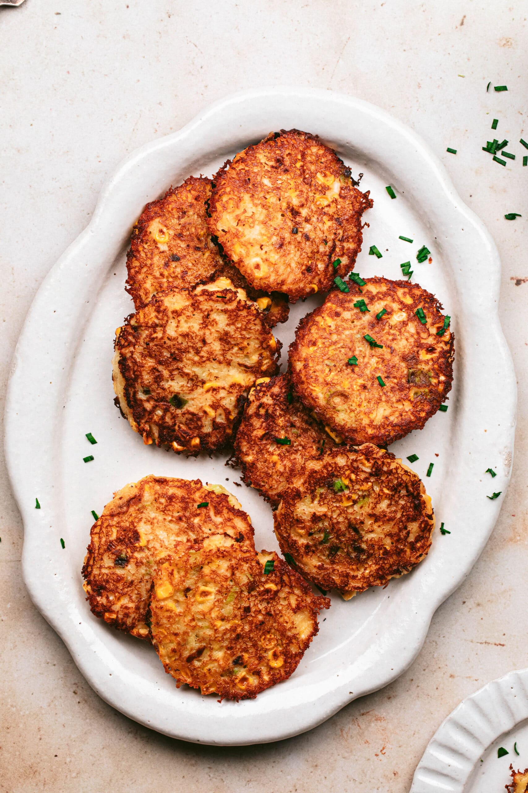 platter of vegan corn fritters