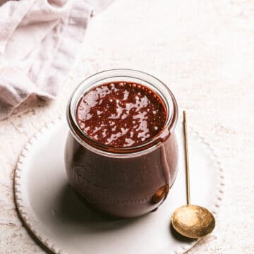 dairy free chocolate sauce in small jar
