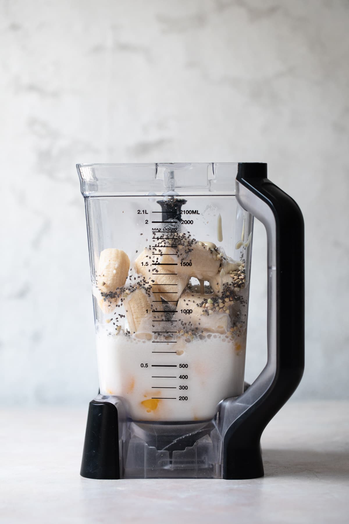 best way to make smoothie - place all ingredients into high powered blender or bullet blender