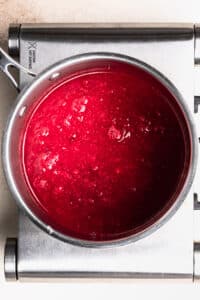 raspberry coulis in saucepan