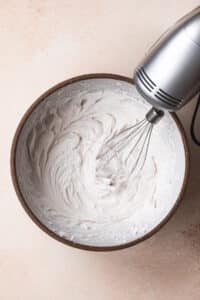 coconut whipped cream in a large mixing bowl