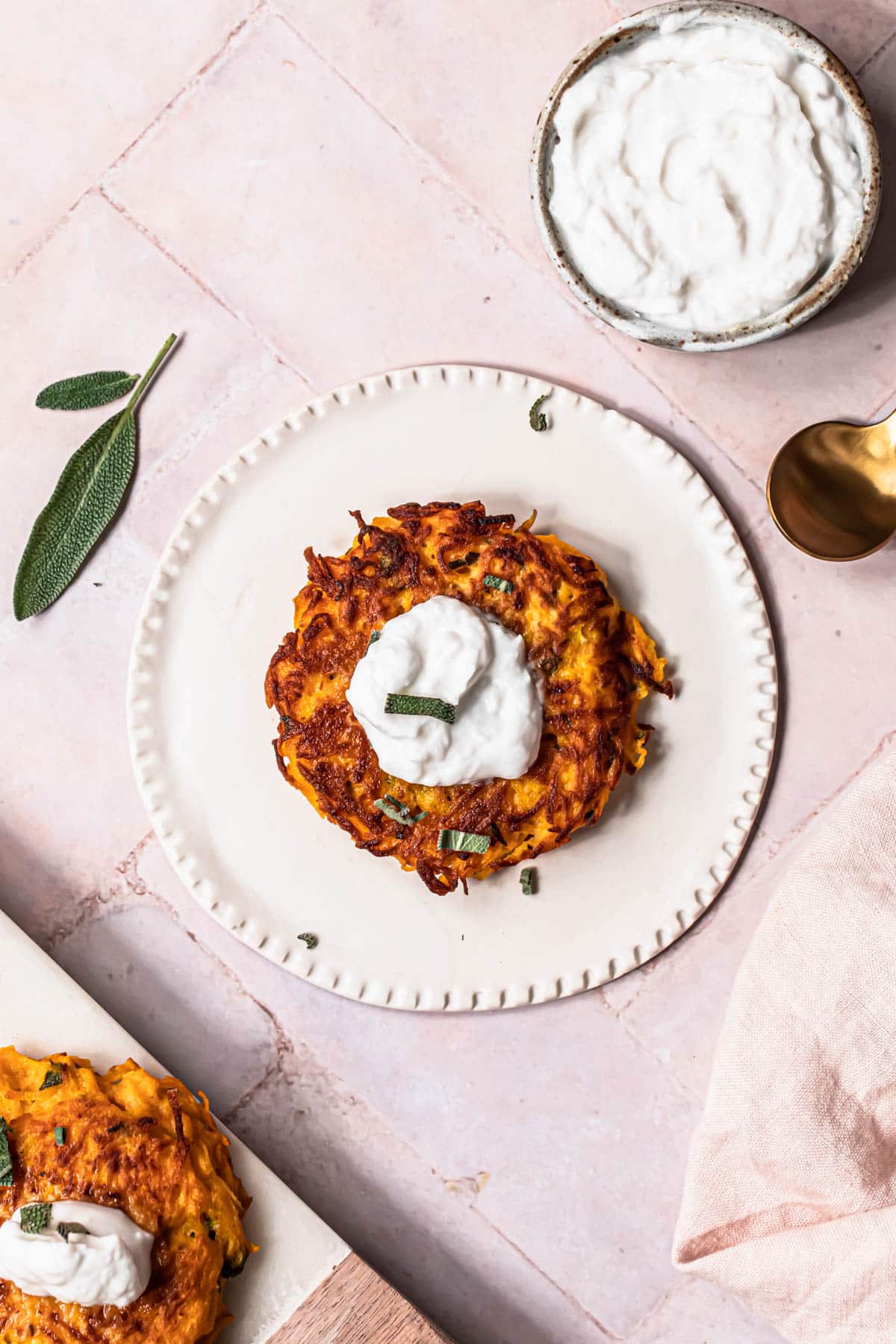 Squash fritters topped with garlic yoghurt.