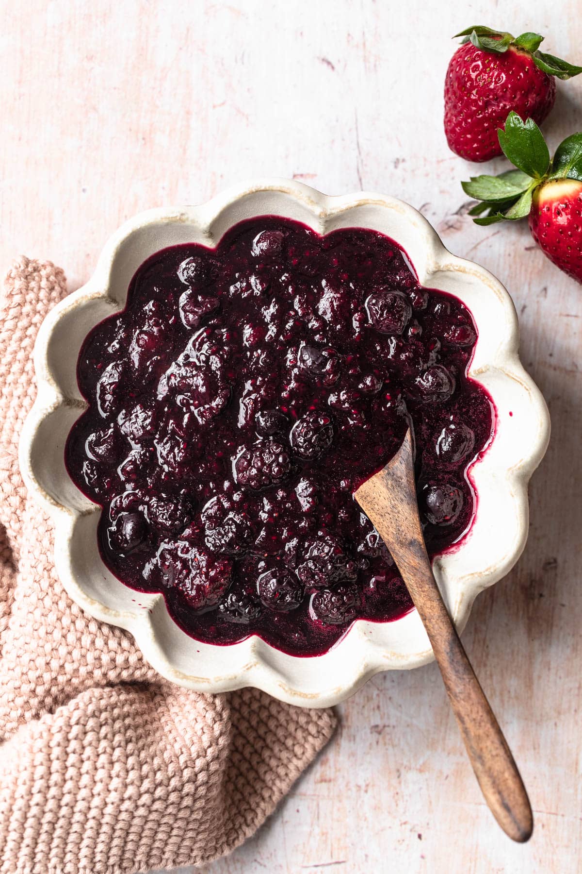 Mixed berry compote using frozen berries in a small bowl.