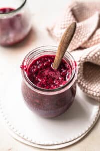 An easy raspberry compote in a small jar, made without corn starch.