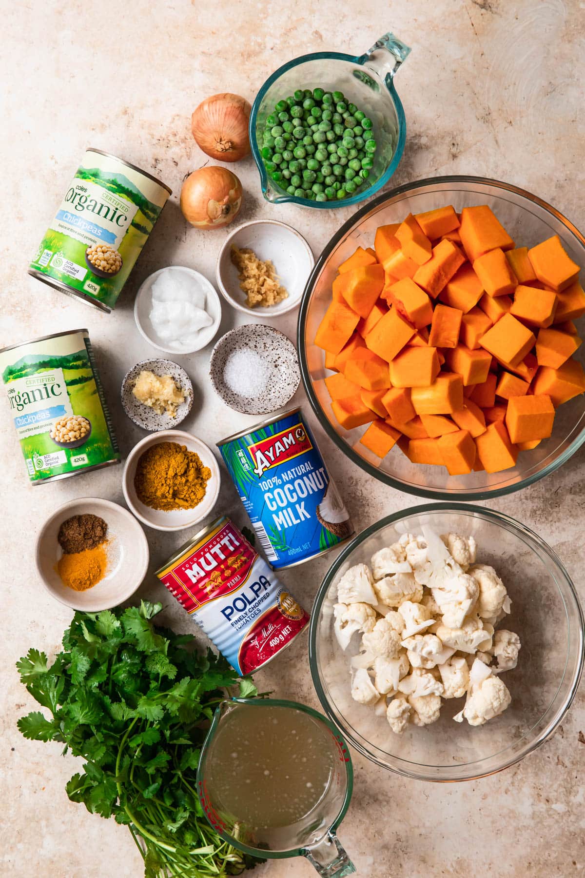 Ingredients for Butternut Squash and Chickpea Curry, laid out in individual containers.