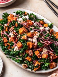 Roasted butternut squash salad on a serving platter.