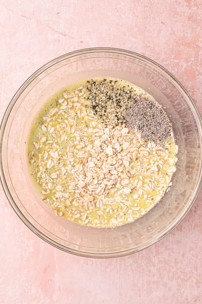 Ingredients for pistachio overnight oats added to a mixing bowl.