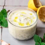 Greek yogurt dressing in a small jar.