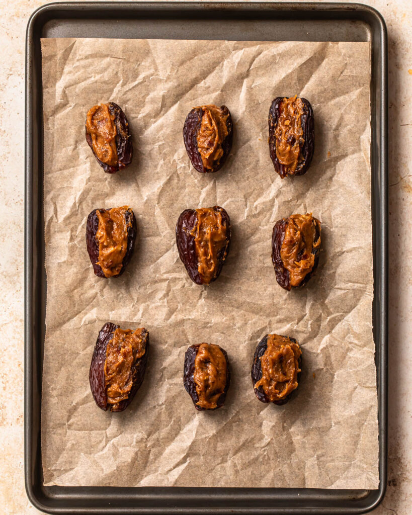 Dates stuffed with pecan salted date caramel.