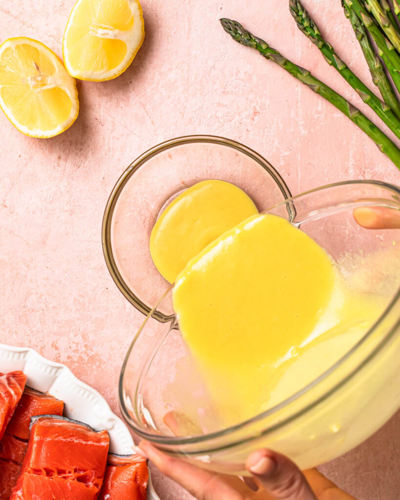 Marinade being poured into a small dish.
