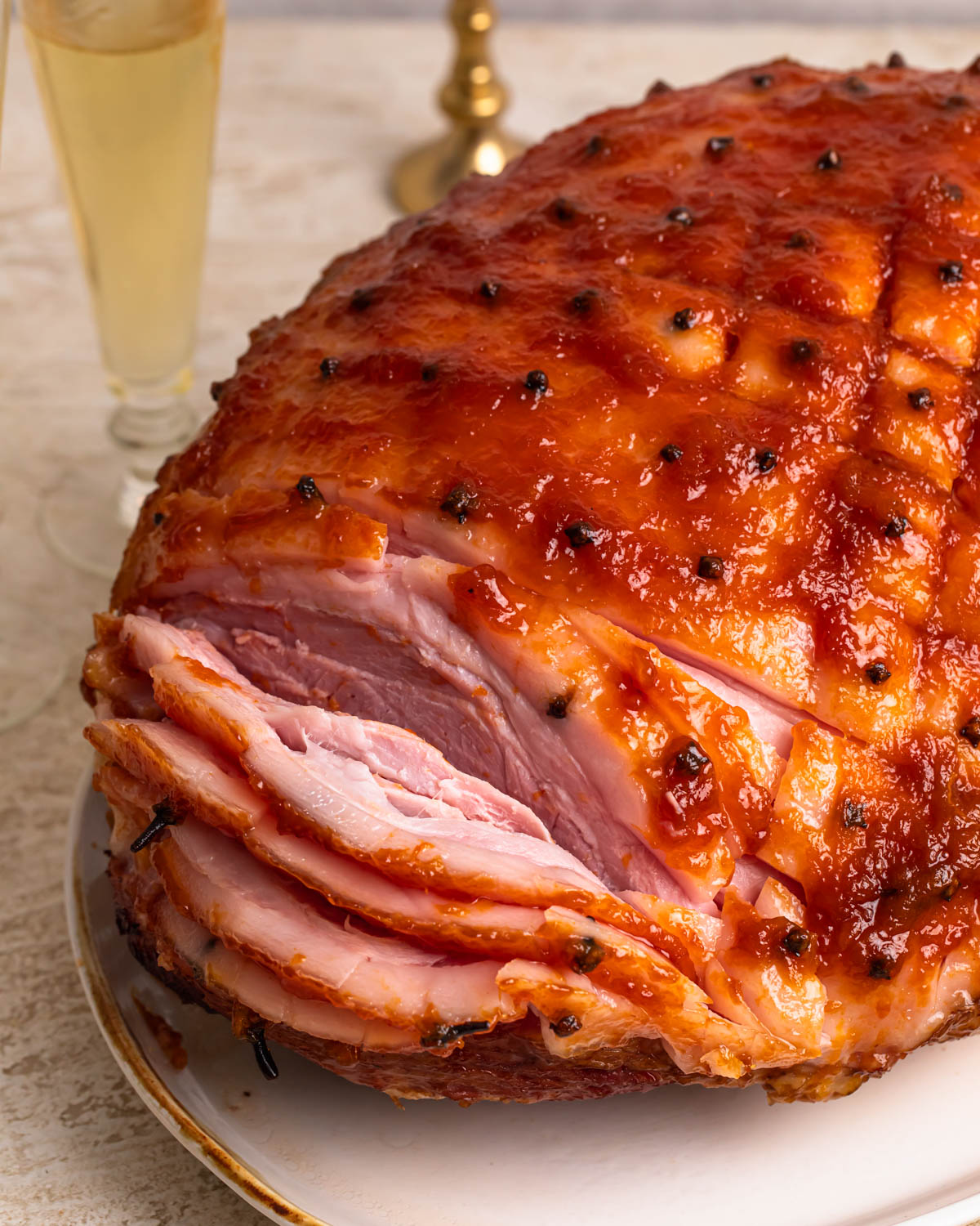 Close up of baked and sliced apricot glazed ham.