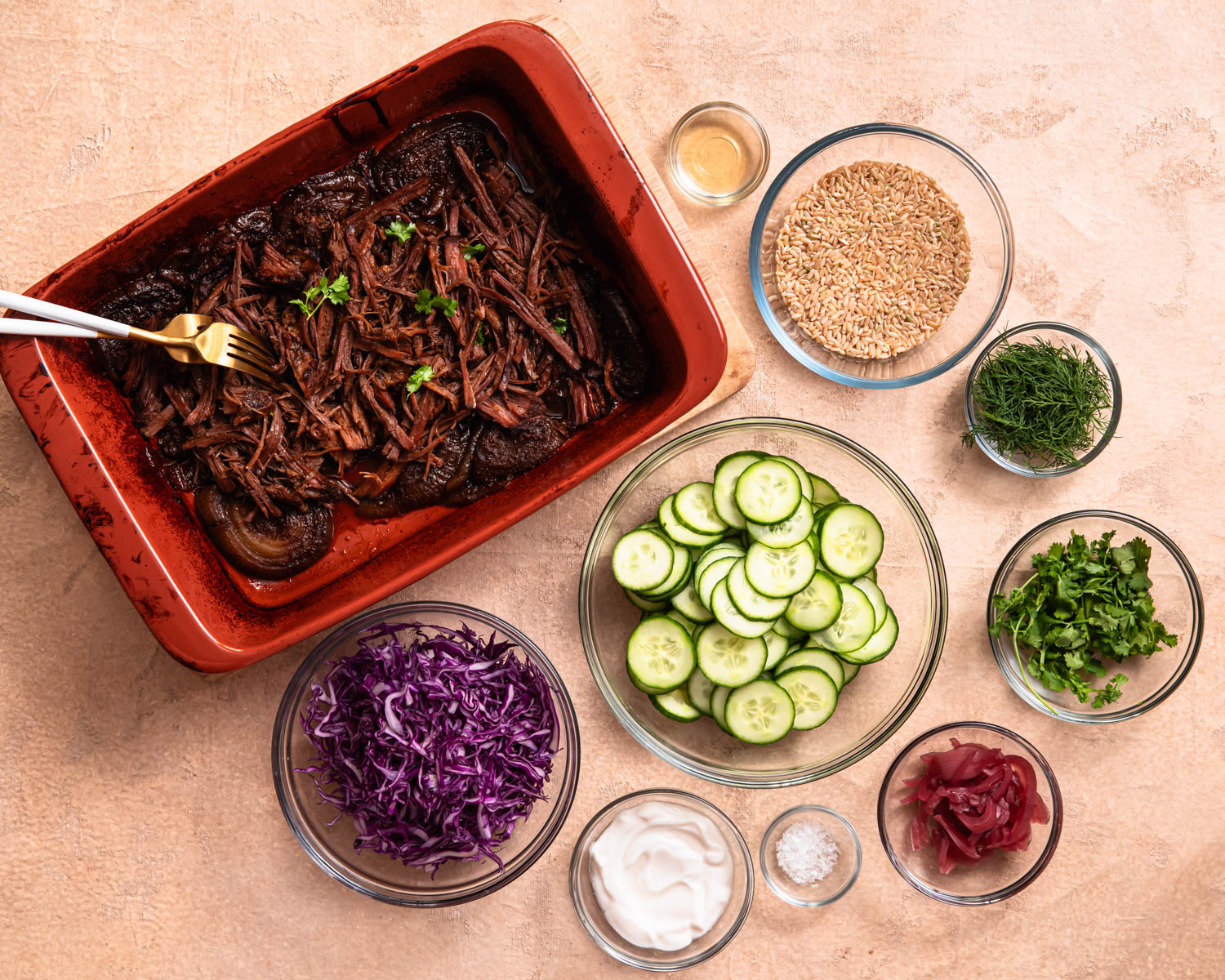 Ingredients for beef brisket bowls laid out in individual bowls.