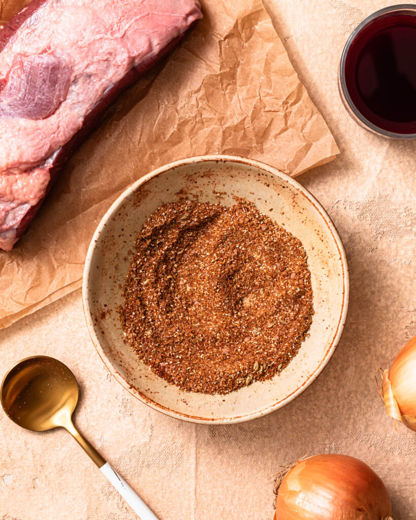 Spice rub for beef brisket in a small bowl. 