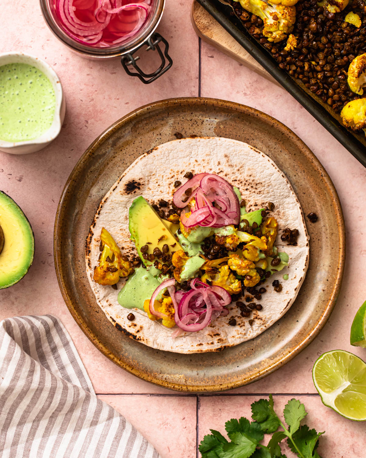 Cauliflower lentil taco assembled on a plate. 