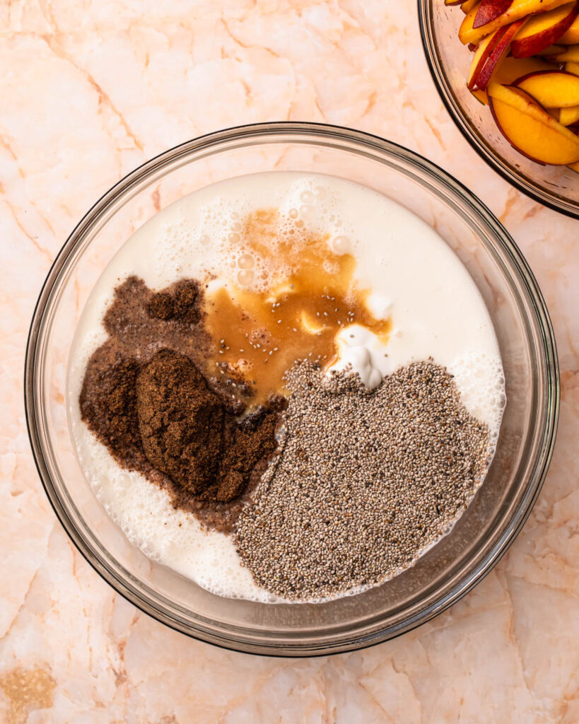 Ingredients for chia and flaxseed pudding added to a large mixing bowl. 