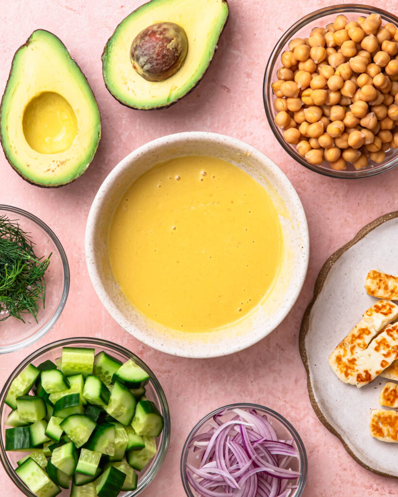 Honey mustard dressing whisked together in a bowl.