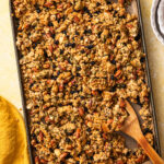Baked lemon blueberry granola on a large baking tray.
