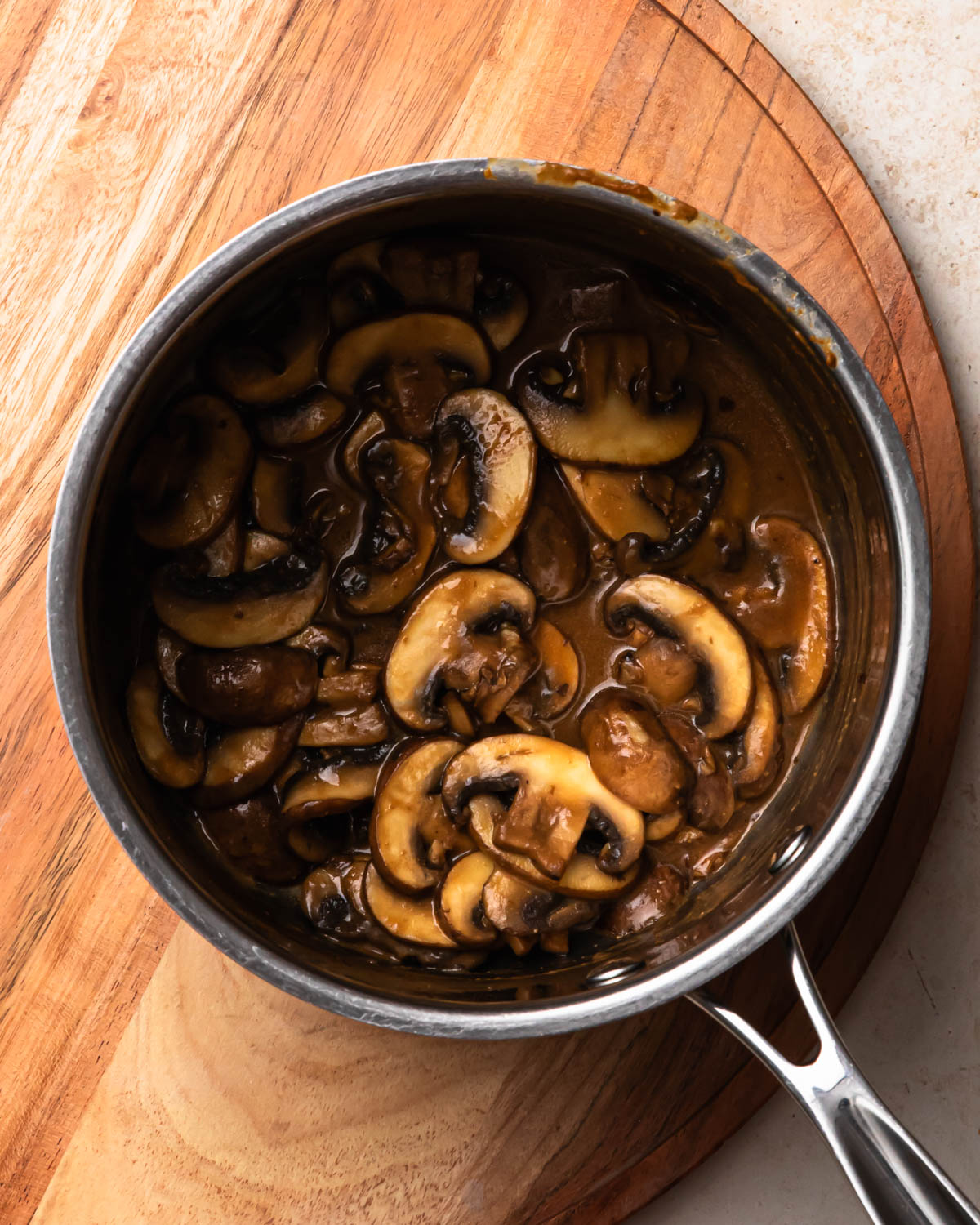 Miso butter mushrooms in a saucepan.