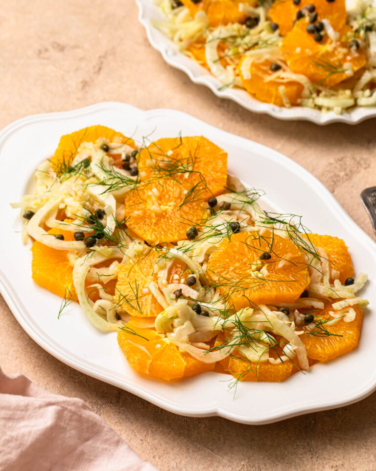 Front on photo of Orange and fennel salad on a platter.