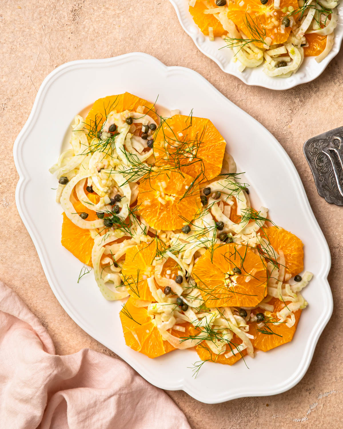 Orange and fennel salad on a platter.