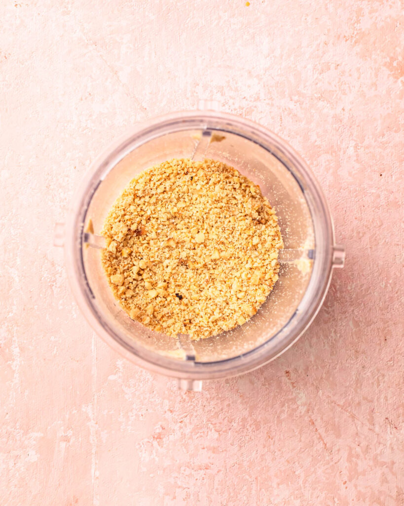 Hazelnuts blended in a bullet blender to get a coarse meal.