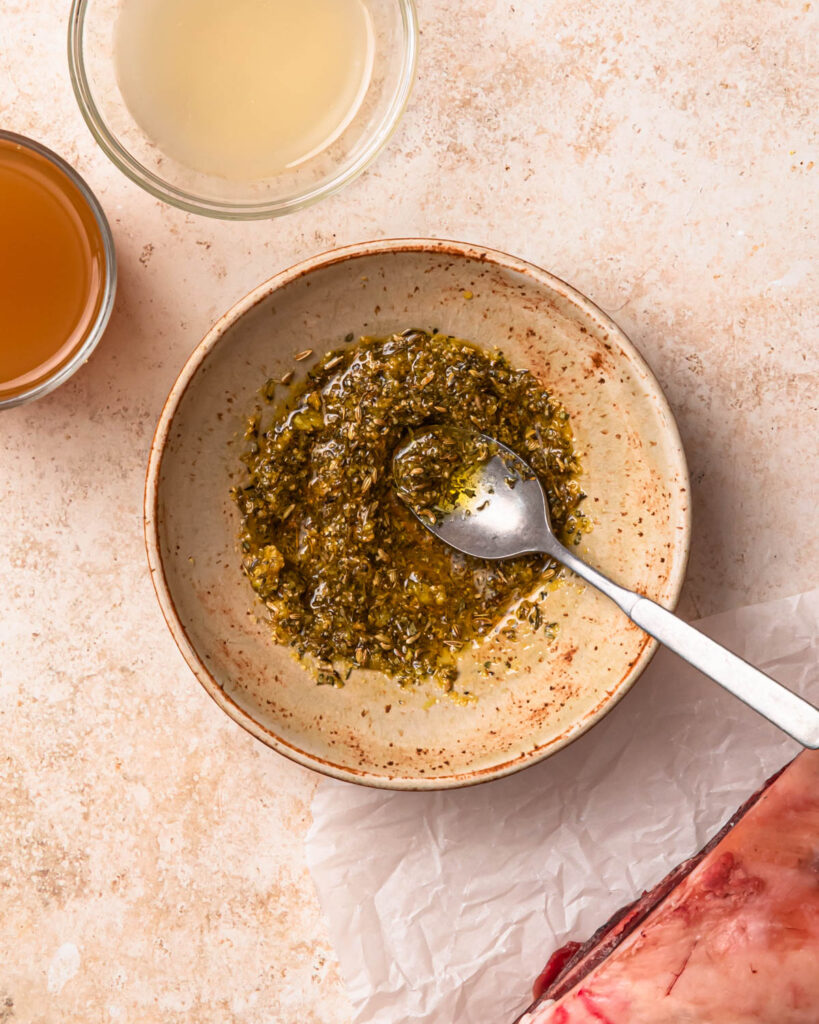 Lemon herb rub mixed together in a small bowl.