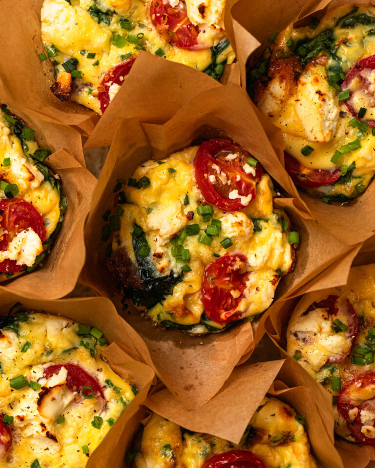 Close up photo of baked breakfast sausage egg cups.
