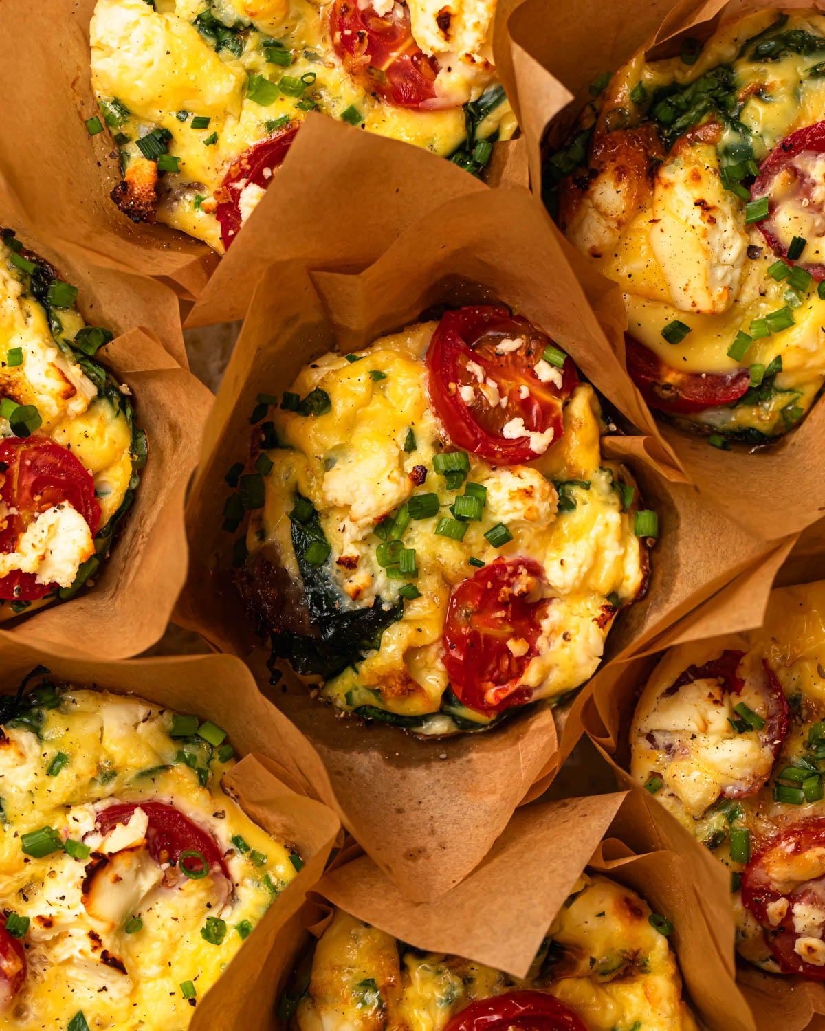 Close up photo of baked breakfast sausage egg cups.