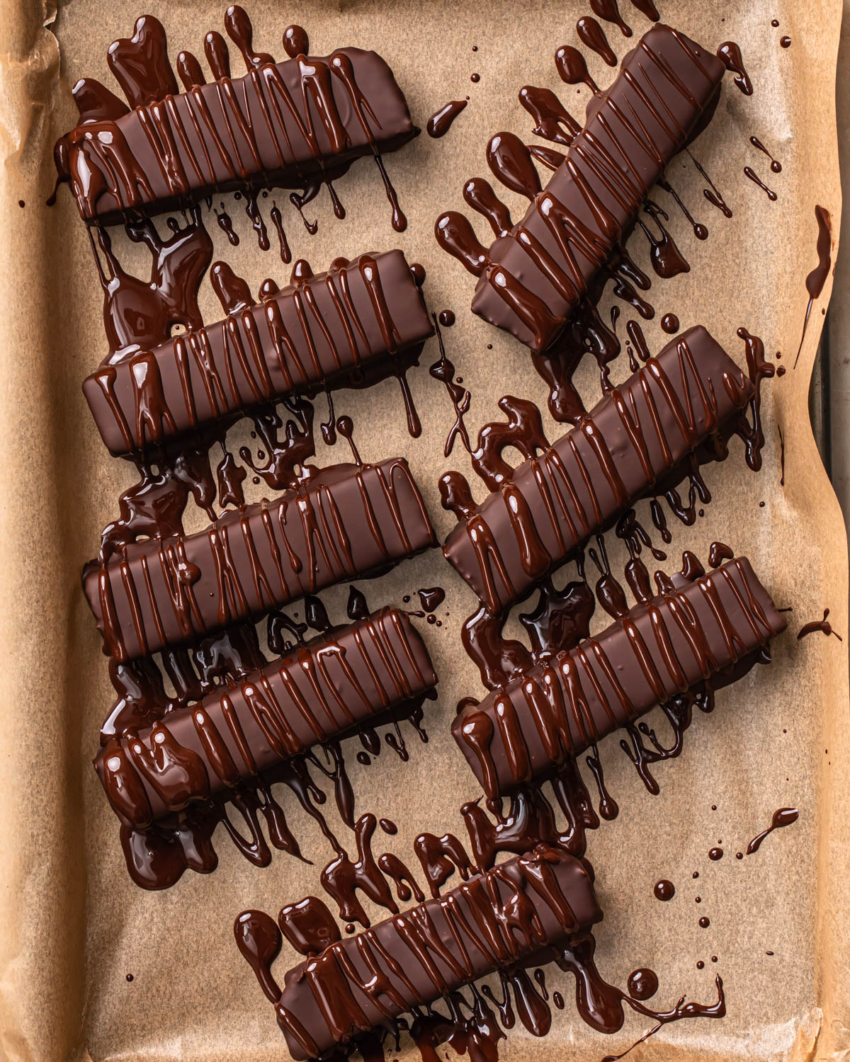 Healthy homemade bounty bars drizzled with dark chocolate.