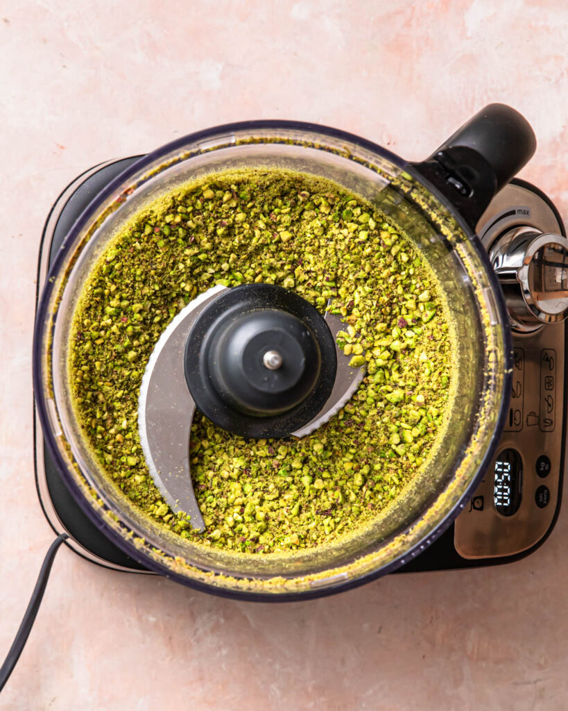 Pistachios blended to a coarse meal in a food processor.