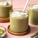 Matcha chia pudding in a jar, topped with yoghurt.