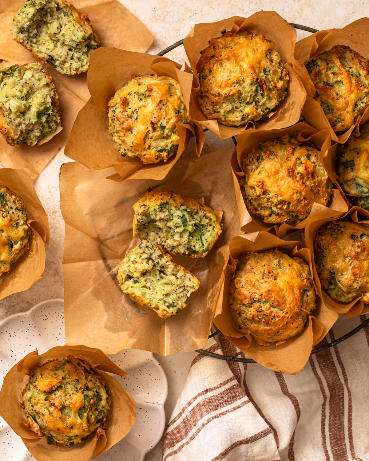 Broccoli and Cheddar gluten free savoury muffins on a wire rack.