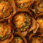 Close up of broccoli cheddar gluten free savoury muffins.