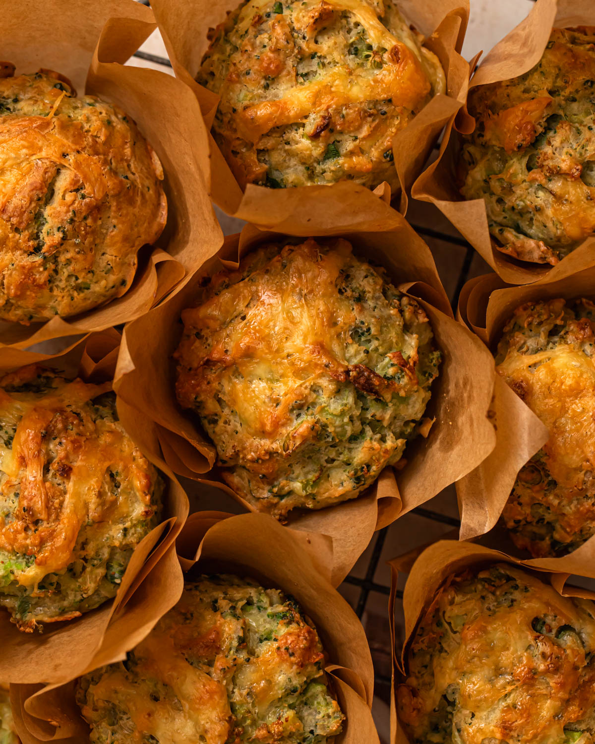 Close up of broccoli cheddar gluten free savoury muffins.