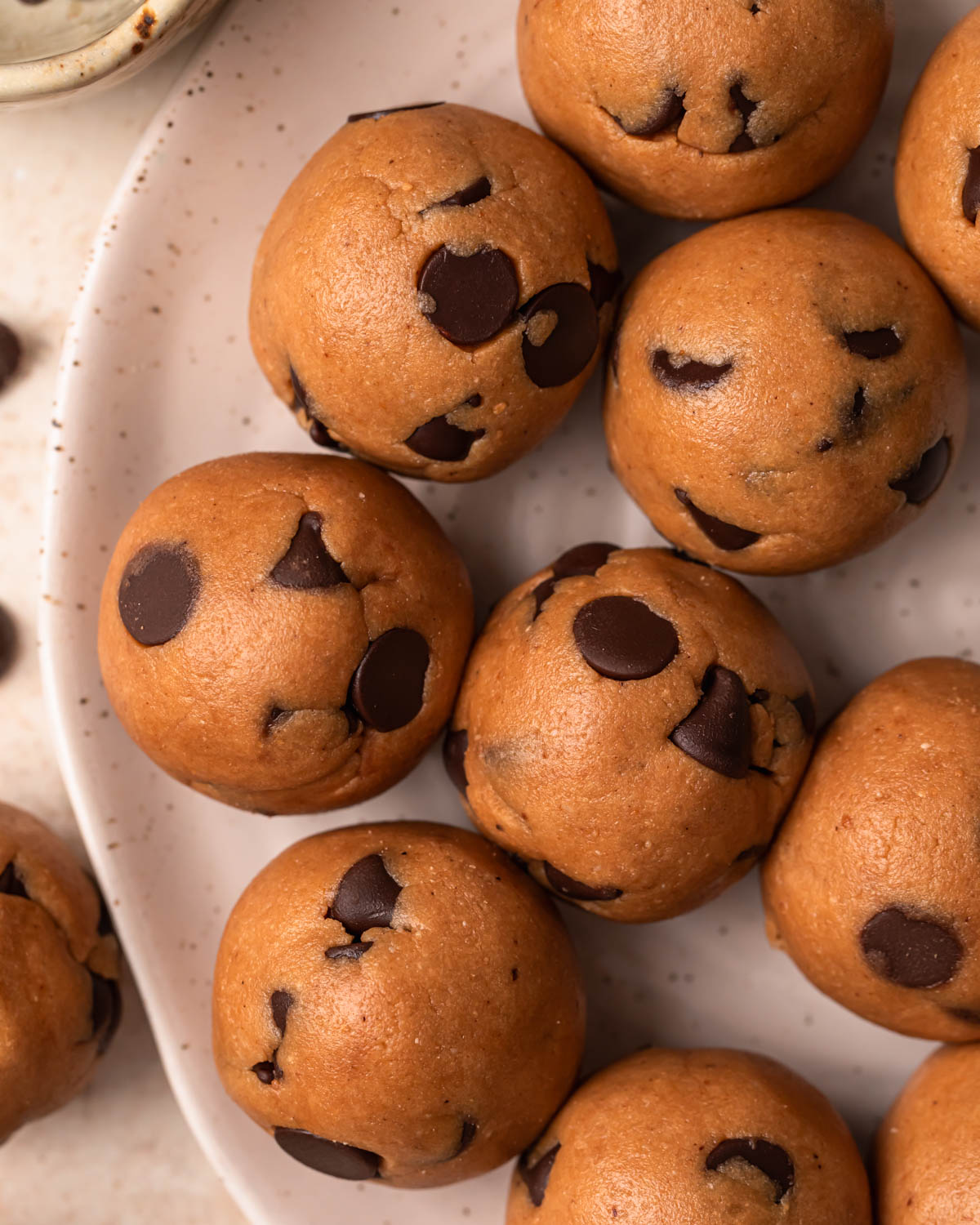 Close up photo of cookie dough protein balls. 