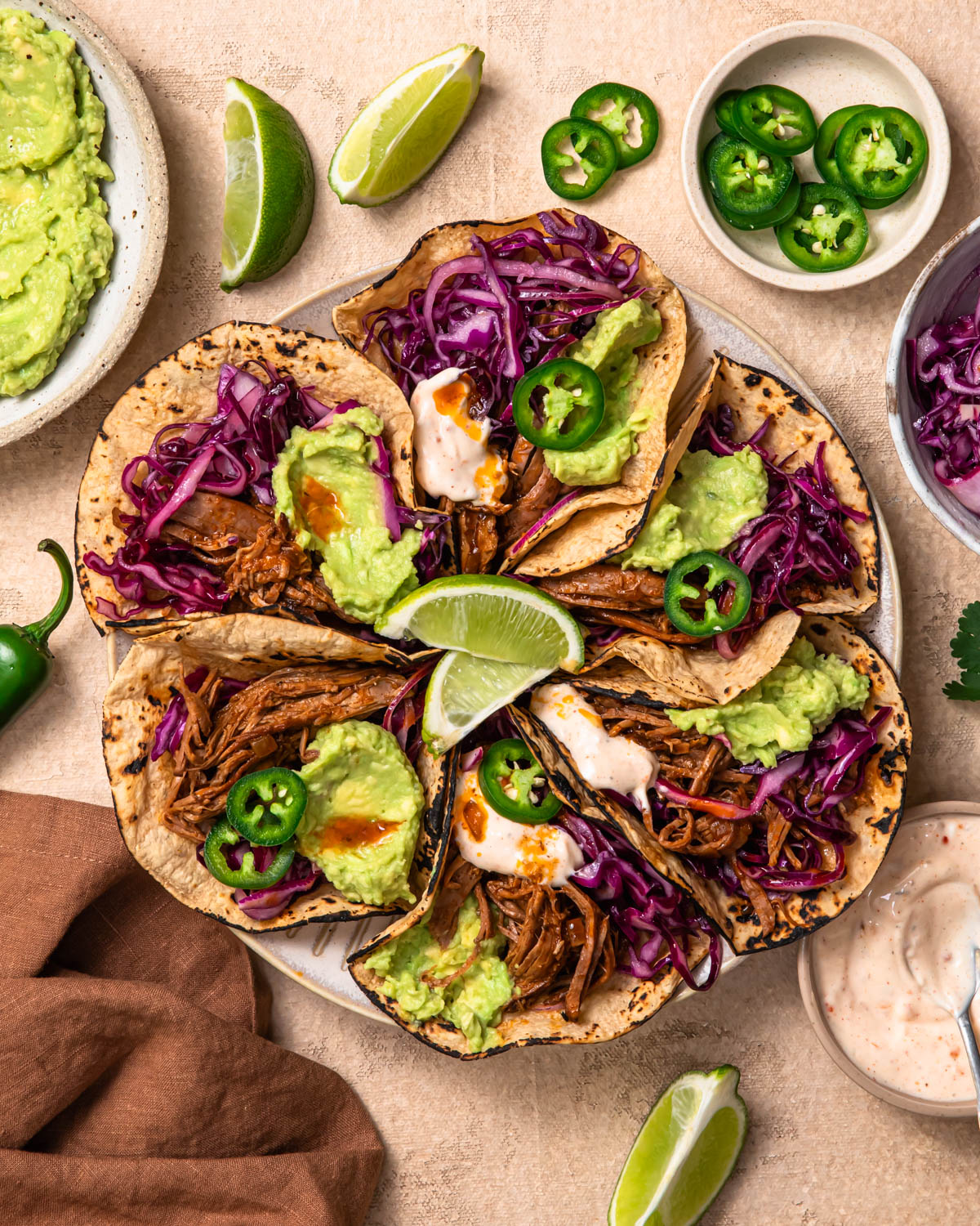 Shredded Beef Slow Cooker tacos on a plate.