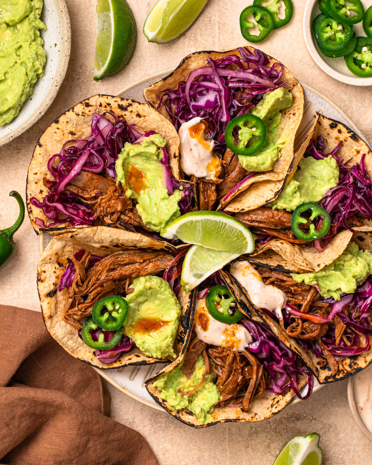 Shredded Beef Slow Cooker tacos on a plate.