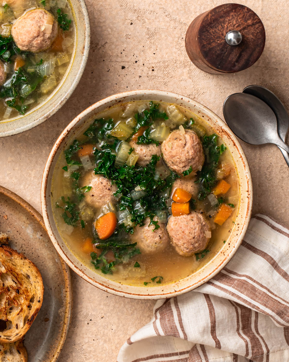 Close up photo of a bowl of slow cooker meatball soup.