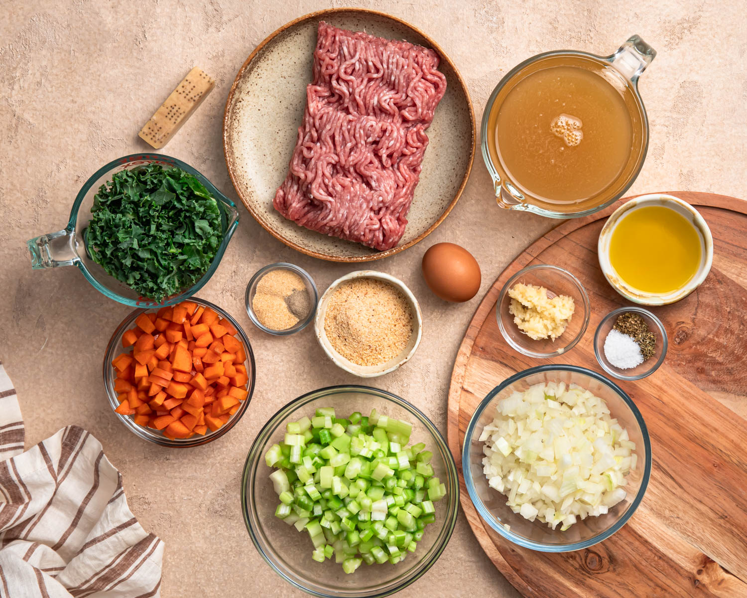Ingredients for slow cooker meatball soup laid out in individual bowls.