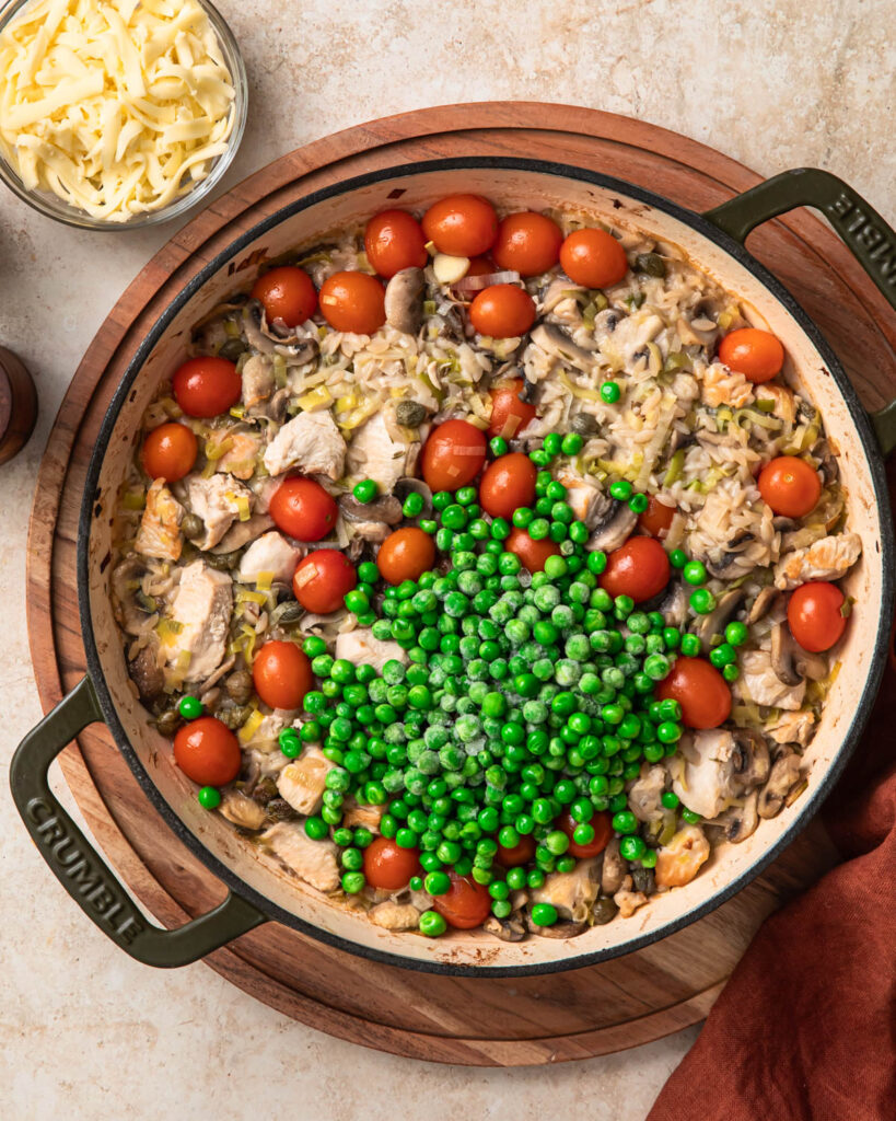 Peas added to one pan chicken orzo pasta bake.