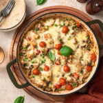 One pan chicken orzo pasta bake in a shallow casserole pan.