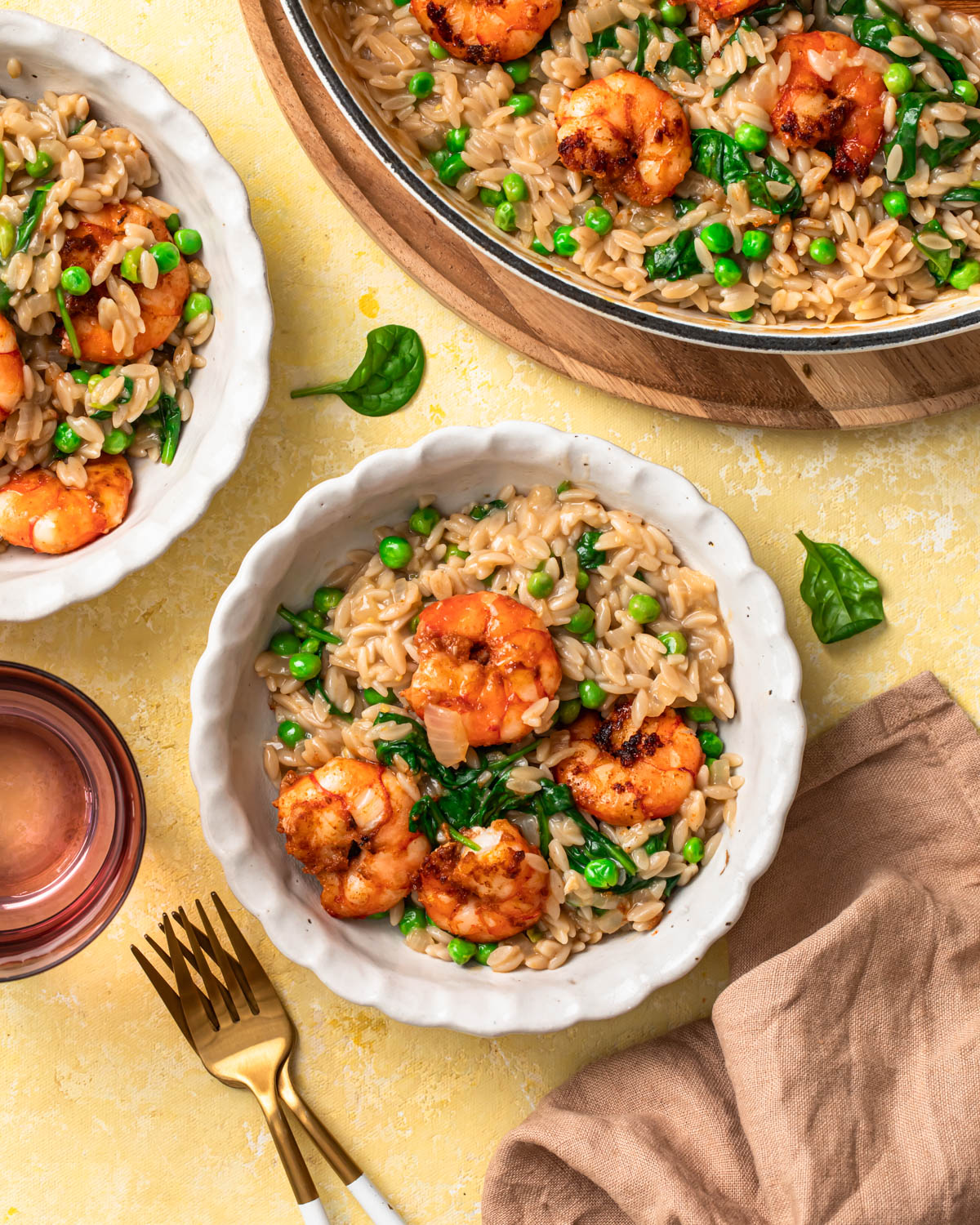 Lemon shrimp orzo dished out into bowls. 