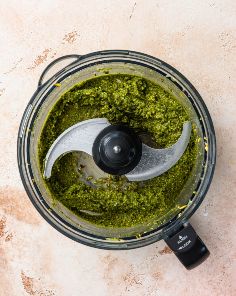 Pistachio pesto in a food processor.