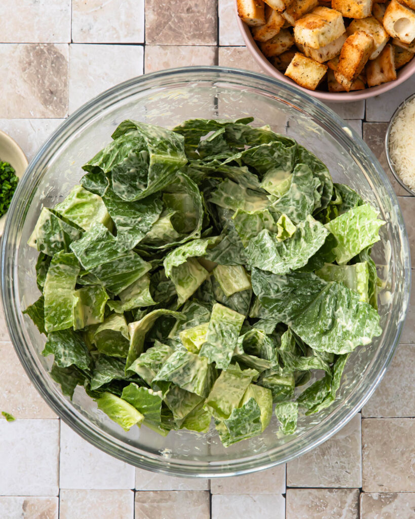 Romaine lettuce tossed with tahini caesar dressing.
