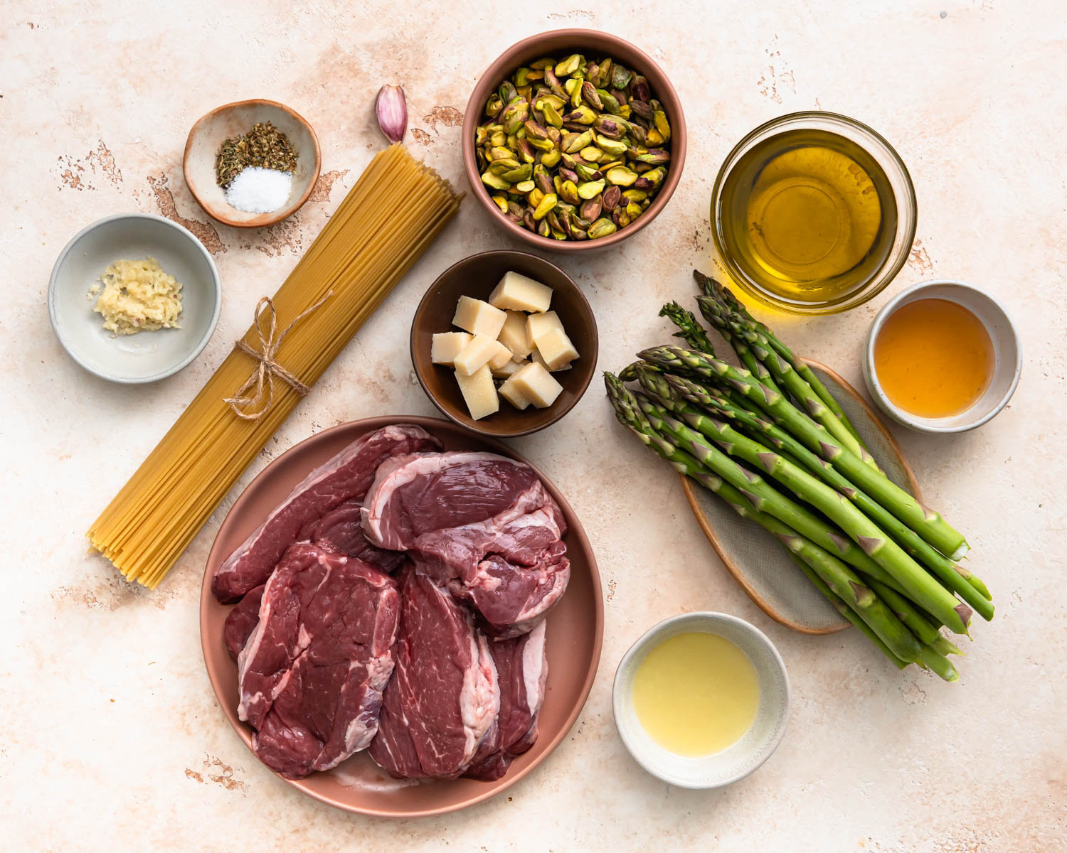 Ingredients needed to make pistachio pesto pasta with lamb rump.
