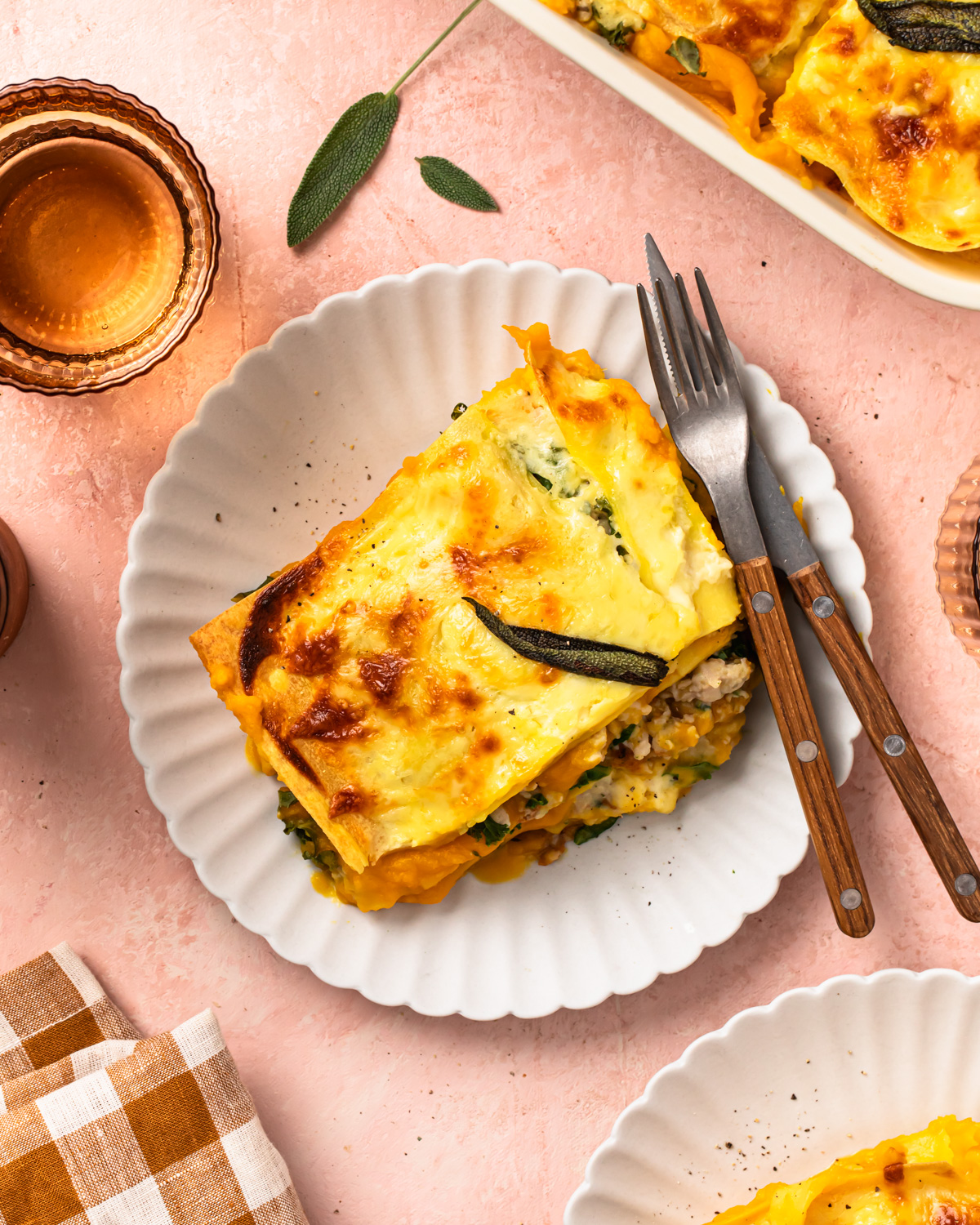 A piece of butternut squash lasagne on a plate. 