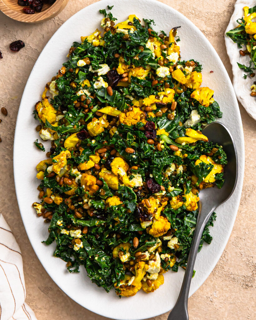 Overhead shot of cauliflower lentil salad on a serving platter.